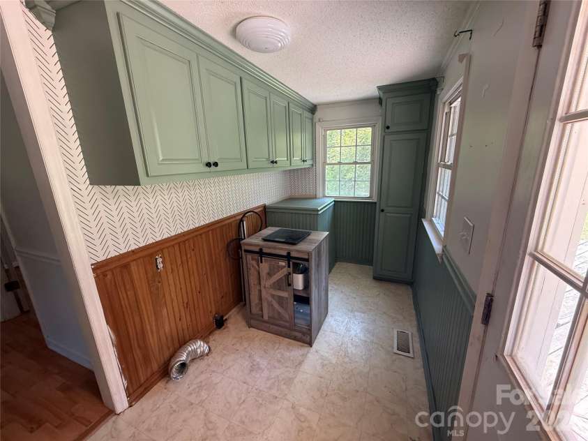 129 Sunset Drive, Troy, NC 27371.  MLS# CAR4384122, YatesRealty ID 30670. Laundry room