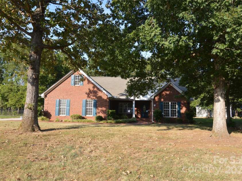 4304 Mara Lane, Monroe, NC 28110.  MLS# CAR4283425, YatesRealty ID 30670. All brick ranch with covered porch on nearly 1/2 acre