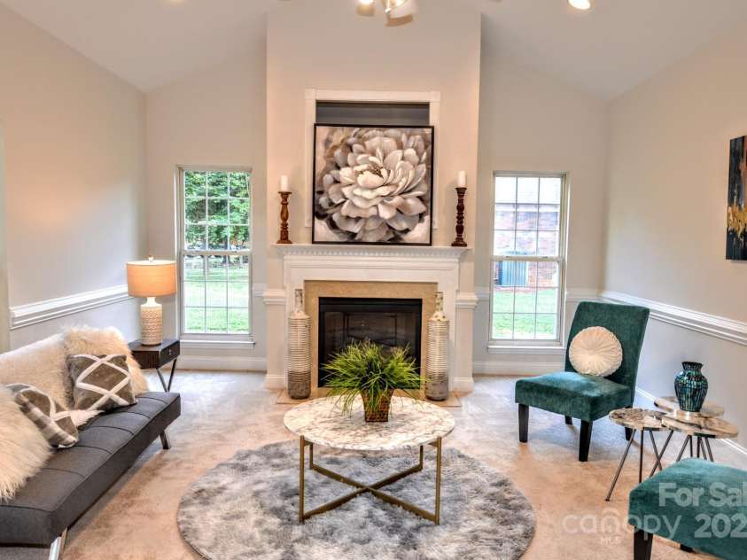 4304 Mara Lane, Monroe, NC 28110.  MLS# CAR4283425, YatesRealty ID 30670. Another view of GR- note the new carpet paint and chair rail