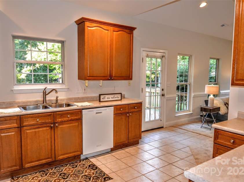 4304 Mara Lane, Monroe, NC 28110.  MLS# CAR4283425, YatesRealty ID 30670. Kitchen is bright and cheery. Seller offering flex money to add your own updates.