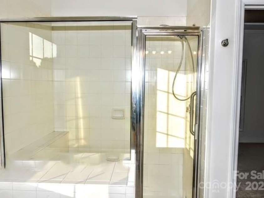 4304 Mara Lane, Monroe, NC 28110.  MLS# CAR4283425, YatesRealty ID 30670. Large separate shower for Master bath