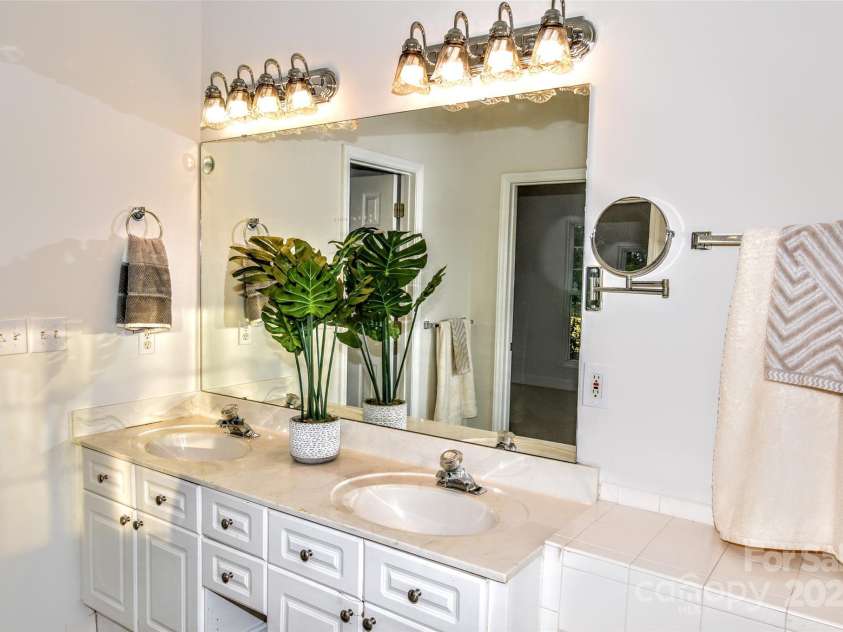 4304 Mara Lane, Monroe, NC 28110.  MLS# CAR4283425, YatesRealty ID 30670. Master bath has dual vanities