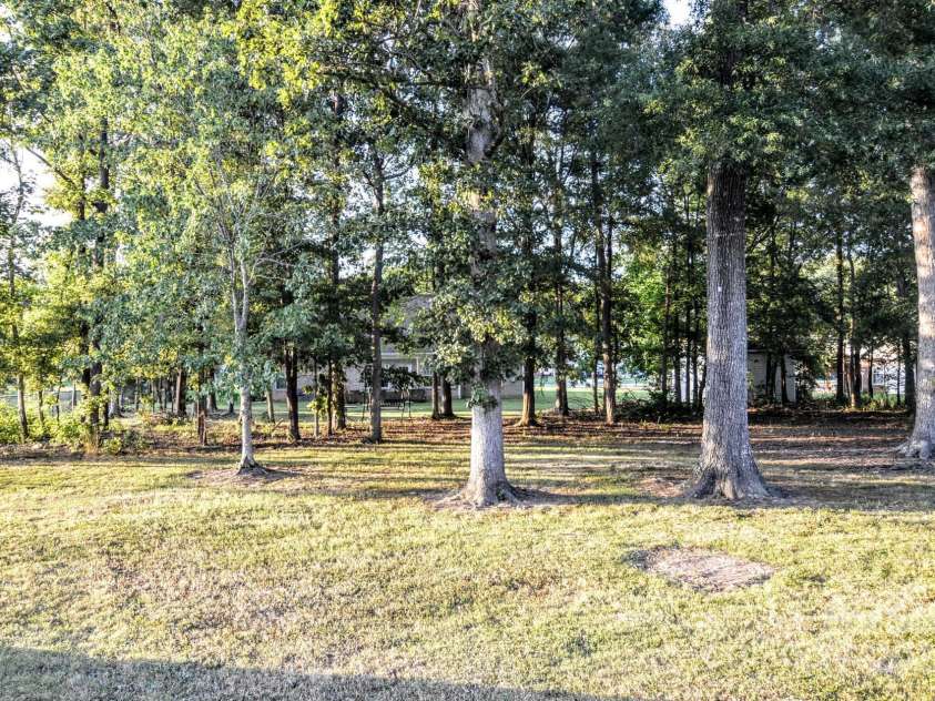 4304 Mara Lane, Monroe, NC 28110.  MLS# CAR4283425, YatesRealty ID 30670. Shady rear yard is huge for play area or add your own pool.