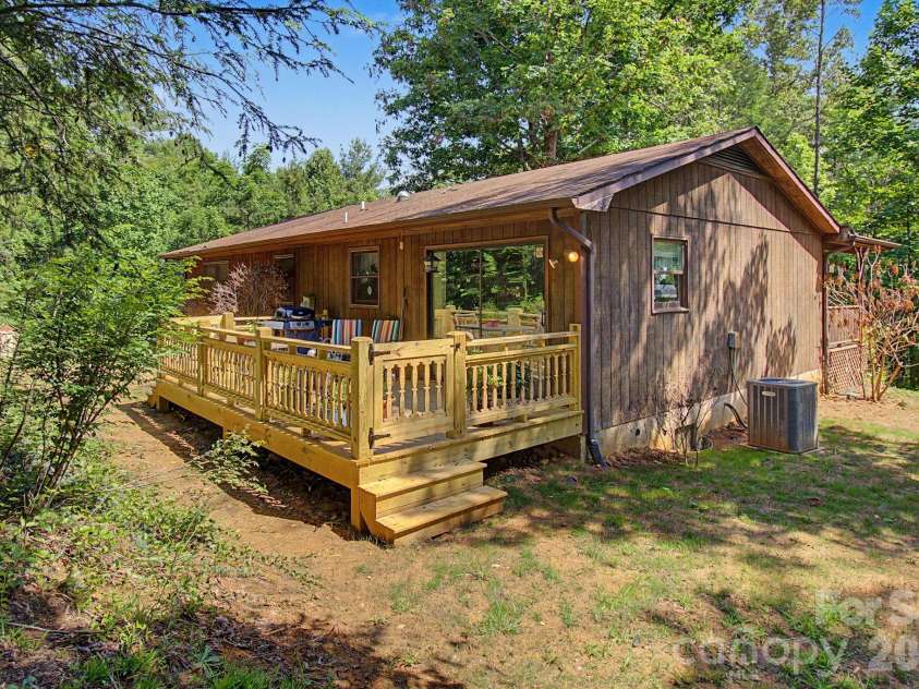 175 Pine Cove Lane, Alexander, NC 28701.  MLS# CAR4388066, YatesRealty ID 30672. Back of home and deck