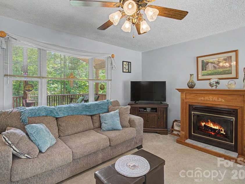 175 Pine Cove Lane, Alexander, NC 28701.  MLS# CAR4388066, YatesRealty ID 30672. Familyroom
