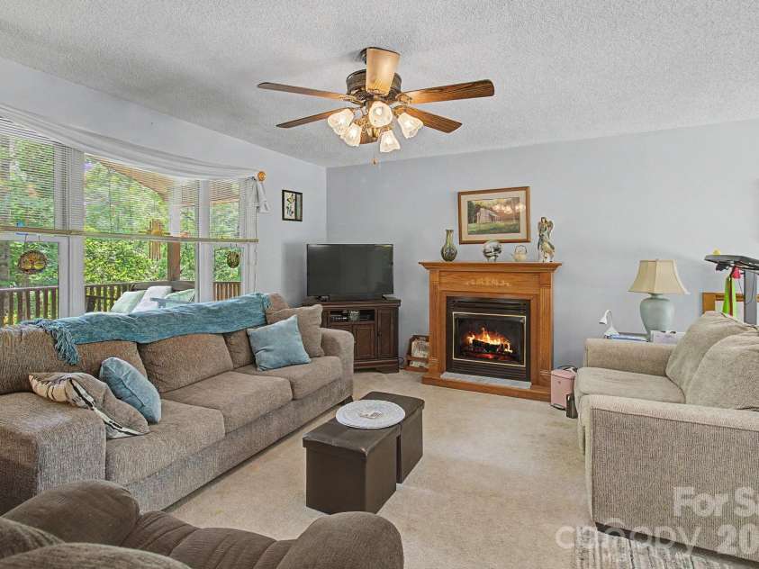 175 Pine Cove Lane, Alexander, NC 28701.  MLS# CAR4388066, YatesRealty ID 30672. Familyroom