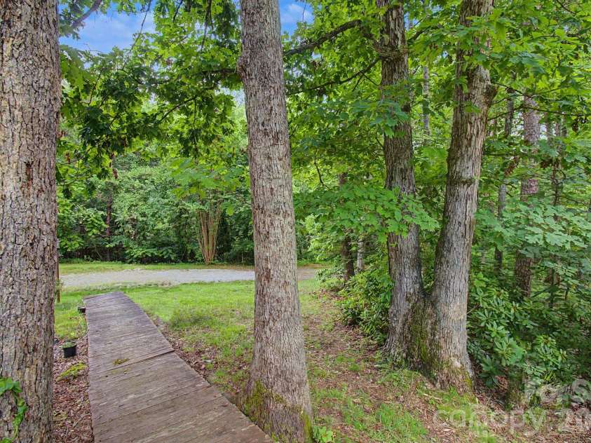 175 Pine Cove Lane, Alexander, NC 28701.  MLS# CAR4388066, YatesRealty ID 30672. Front walk