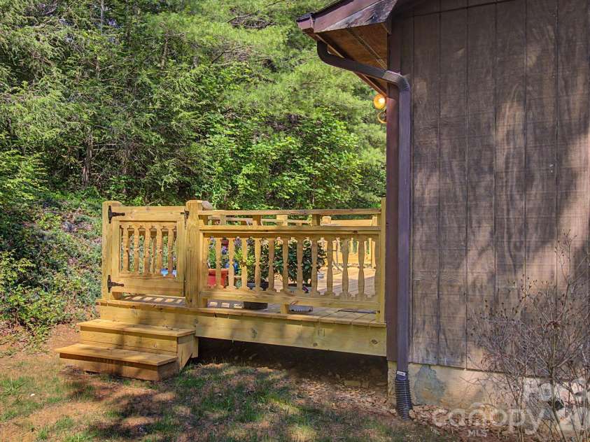 175 Pine Cove Lane, Alexander, NC 28701.  MLS# CAR4388066, YatesRealty ID 30672. Side of back deck