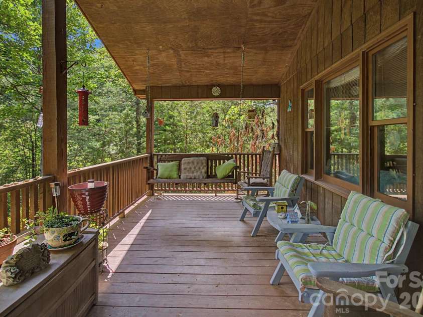 175 Pine Cove Lane, Alexander, NC 28701.  MLS# CAR4388066, YatesRealty ID 30672. Spacious front porch