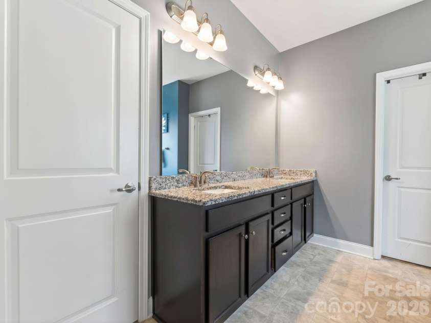 207 Vanderbilt Boulevard, Locust, NC 28097.  MLS# CAR4371476, YatesRealty ID 30677. Bathroom
