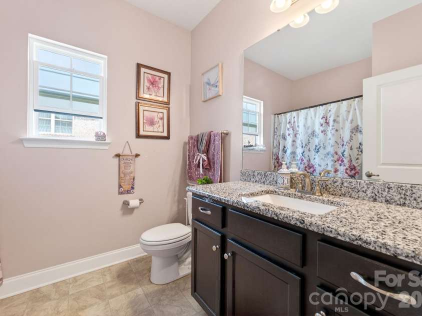 207 Vanderbilt Boulevard, Locust, NC 28097.  MLS# CAR4371476, YatesRealty ID 30677. Bathroom