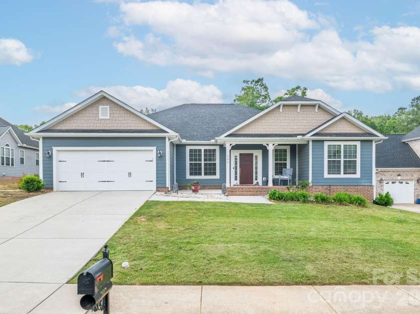 207 Vanderbilt Boulevard, Locust, NC 28097.  MLS# CAR4371476, YatesRealty ID 30677. Exterior