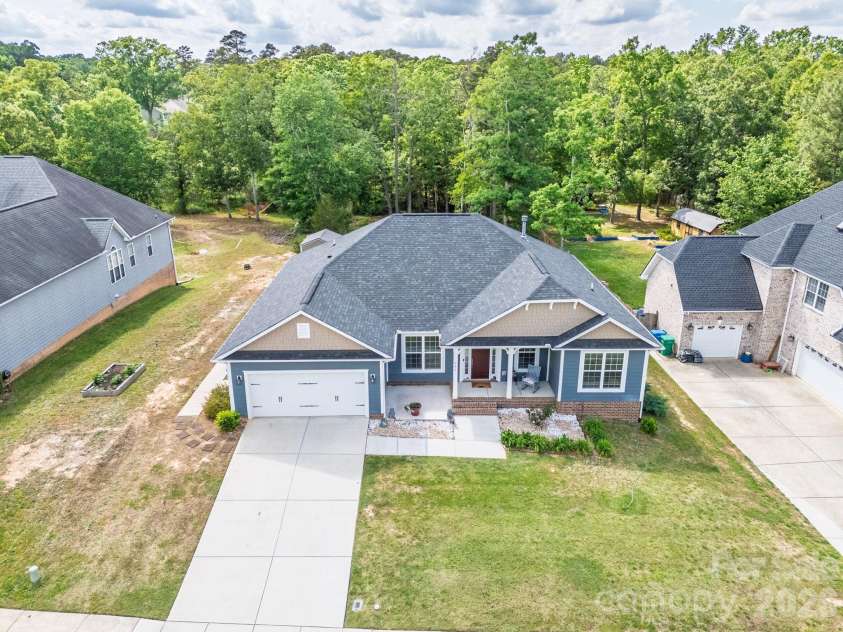 207 Vanderbilt Boulevard, Locust, NC 28097.  MLS# CAR4371476, YatesRealty ID 30677. Exterior
