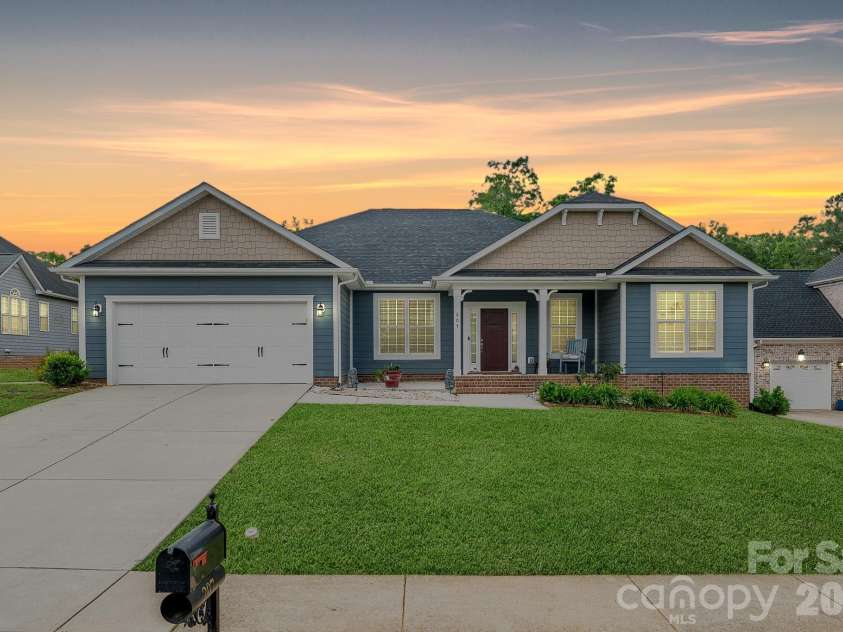 207 Vanderbilt Boulevard, Locust, NC 28097.  MLS# CAR4371476, YatesRealty ID 30677. Exterior