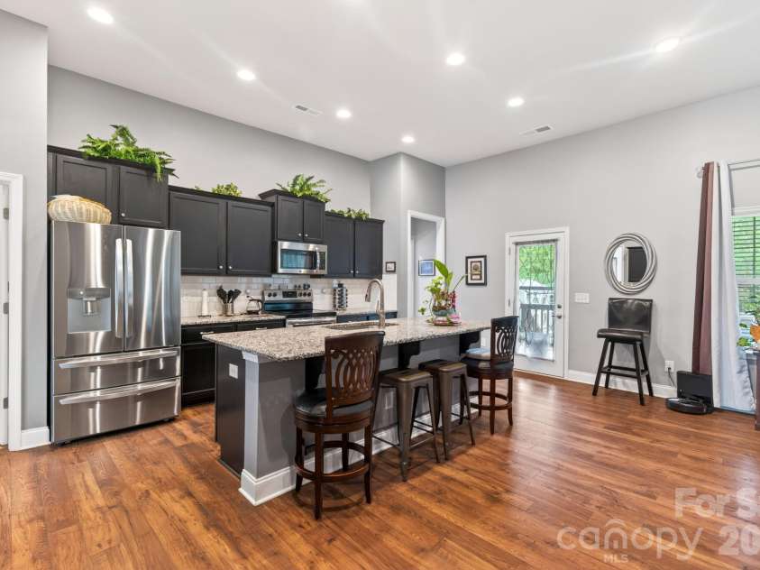 207 Vanderbilt Boulevard, Locust, NC 28097.  MLS# CAR4371476, YatesRealty ID 30677. Kitchen