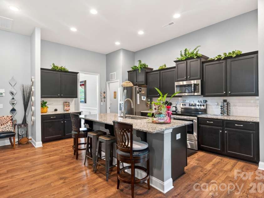 207 Vanderbilt Boulevard, Locust, NC 28097.  MLS# CAR4371476, YatesRealty ID 30677. Kitchen