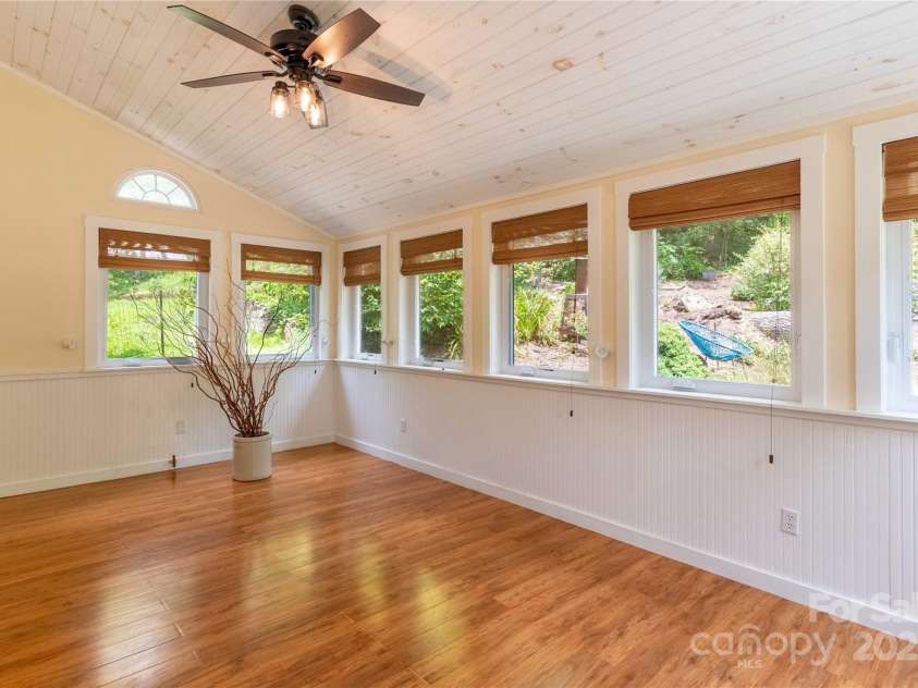 5 Koenig Way, Asheville, NC 28804.  MLS# CAR4280267, YatesRealty ID 3068. Fully finished sunroom.