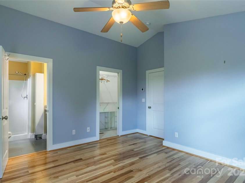 5 Koenig Way, Asheville, NC 28804.  MLS# CAR4280267, YatesRealty ID 3068. Primary bedroom with ensuite bathroom and walk-in closet