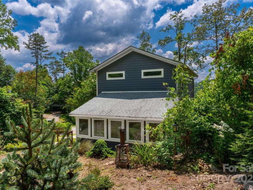 5 Koenig Way, Asheville, NC 28804.  MLS# CAR4280267, YatesRealty ID 3068. Sun room viewed from back yard.