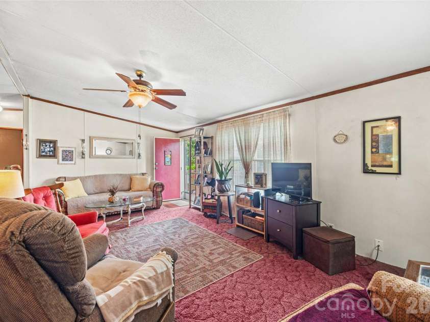 323 Carlyle Road, Troutman, NC 28166.  MLS# CAR4381311, YatesRealty ID 30683. Living Room