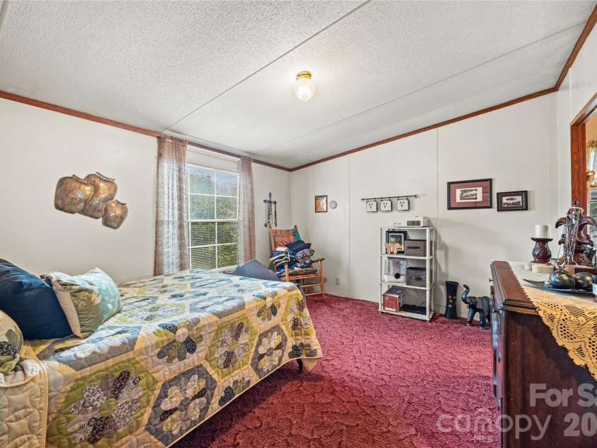323 Carlyle Road, Troutman, NC 28166.  MLS# CAR4381311, YatesRealty ID 30683. Primary bathroom is attached.