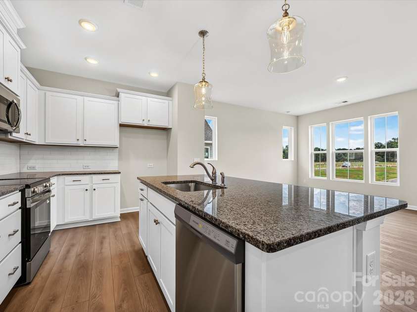 6573 Fire Lily Lane, Charlotte, NC 28216.  MLS# CAR4385669, YatesRealty ID 30692. 