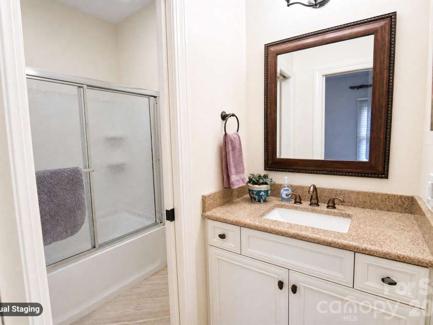 880 Hickory Stick Drive, Fort Mill, SC 29715.  MLS# CAR4379413, YatesRealty ID 30693. Bedroom 4 Vanity & Shared bathroom