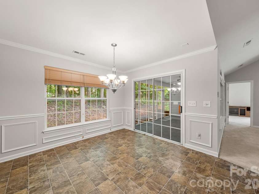 1437 Deer Forest Drive, Fort Mill, SC 29707.  MLS# CAR4385819, YatesRealty ID 30694. Dining Room Opens to Porch
