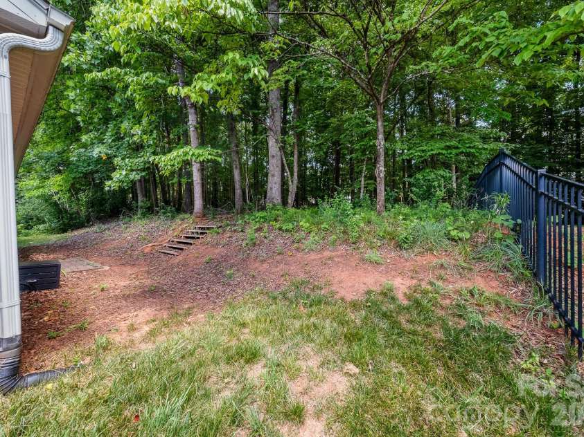 1437 Deer Forest Drive, Fort Mill, SC 29707.  MLS# CAR4385819, YatesRealty ID 30694. Home Backs To Woods