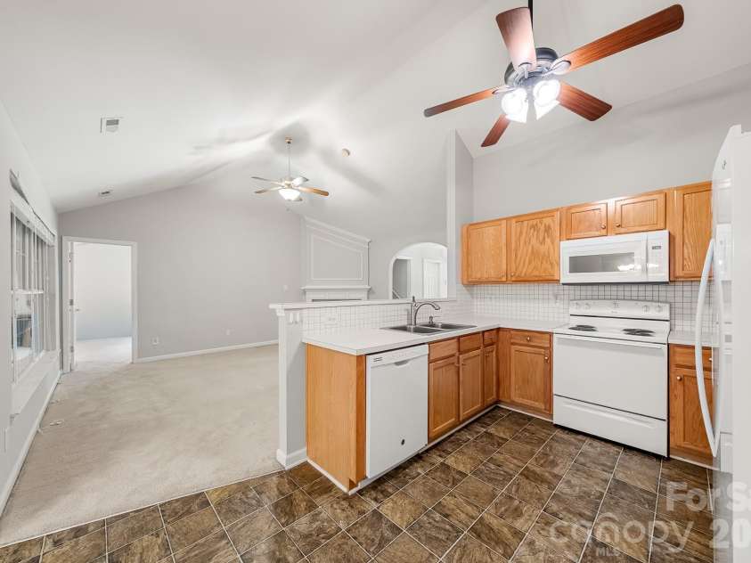1437 Deer Forest Drive, Fort Mill, SC 29707.  MLS# CAR4385819, YatesRealty ID 30694. Kitchen Open to LR/DR