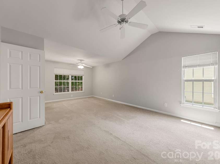 1437 Deer Forest Drive, Fort Mill, SC 29707.  MLS# CAR4385819, YatesRealty ID 30694. Primary BR With Vaulted Ceilings