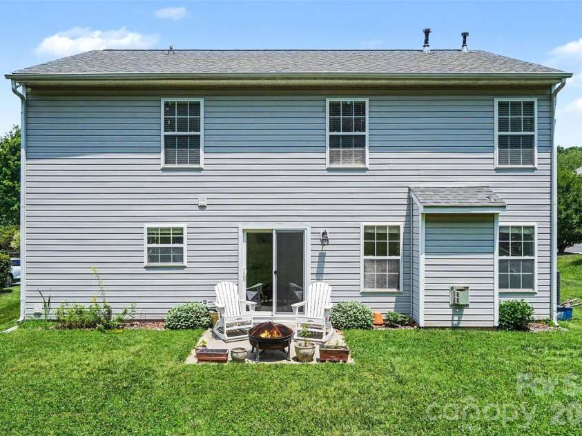 6019 Firethorne Lane, Concord, NC 28025.  MLS# CAR4391302, YatesRealty ID 30700. Back yard view