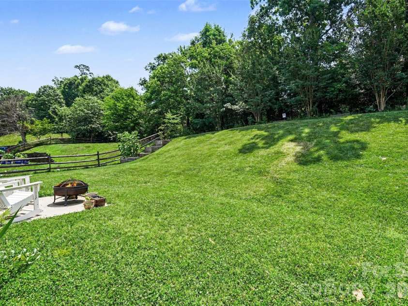 6019 Firethorne Lane, Concord, NC 28025.  MLS# CAR4391302, YatesRealty ID 30700. Backyard view with patio. 