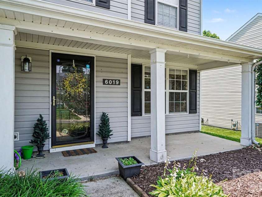 6019 Firethorne Lane, Concord, NC 28025.  MLS# CAR4391302, YatesRealty ID 30700. Covered Front Porch