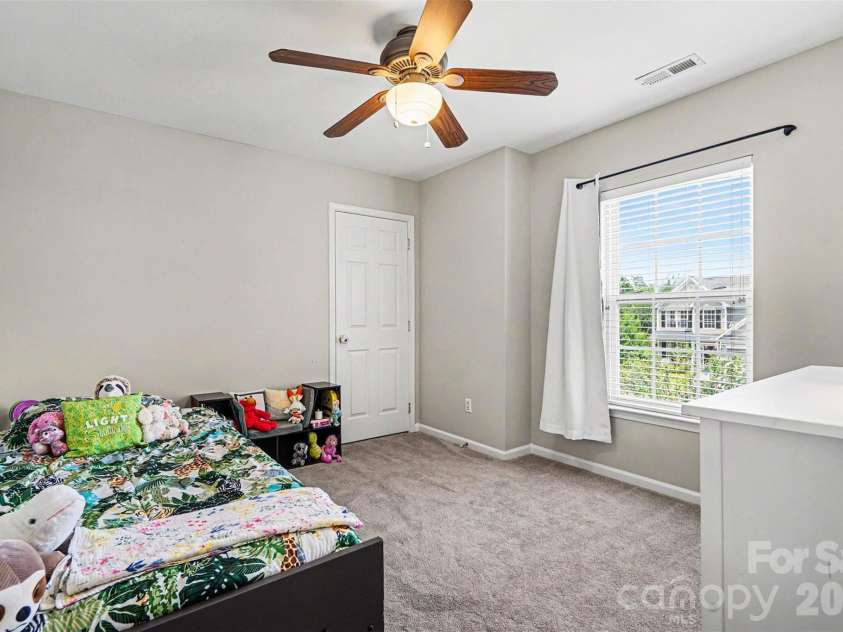 6019 Firethorne Lane, Concord, NC 28025.  MLS# CAR4391302, YatesRealty ID 30700. Secondary Bedroom 3