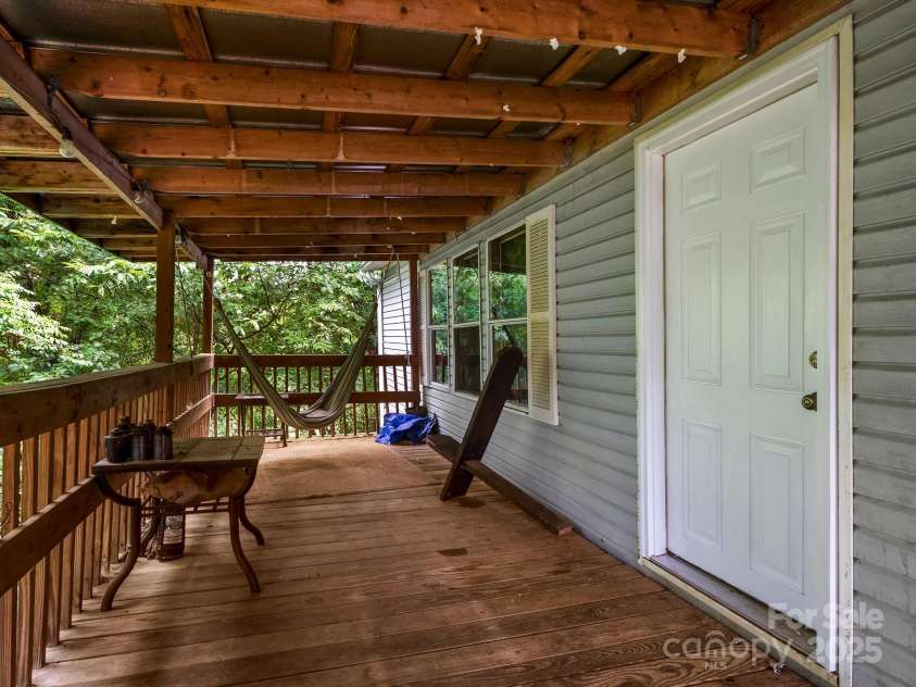 238 Brickyard Road, Asheville, NC 28806.  MLS# CAR4279435, YatesRealty ID 30701. Large Covered back porch