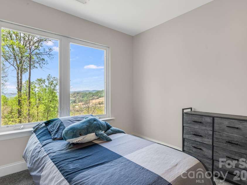 35 Chesten Mountain Drive, Asheville, NC 28803.  MLS# CAR4370920, YatesRealty ID 30701. Upper Bedroom with attached Bath