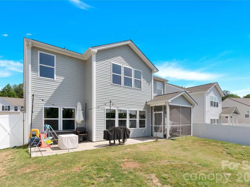 3153 Pinehills Way, Mount Holly, NC 28120.  MLS# CAR4360789, YatesRealty ID 30702. Back yard