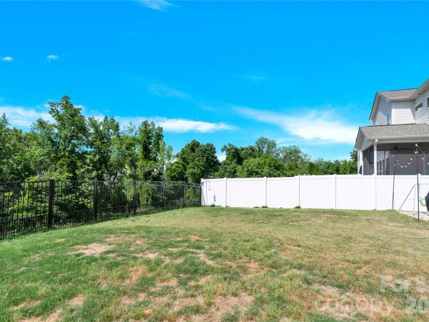 3153 Pinehills Way, Mount Holly, NC 28120.  MLS# CAR4360789, YatesRealty ID 30702. Back yard area