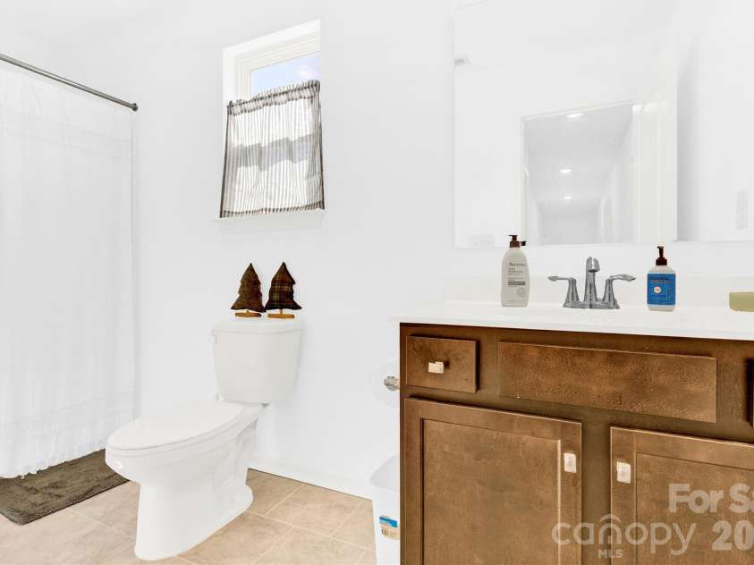 3153 Pinehills Way, Mount Holly, NC 28120.  MLS# CAR4360789, YatesRealty ID 30702. Bathroom