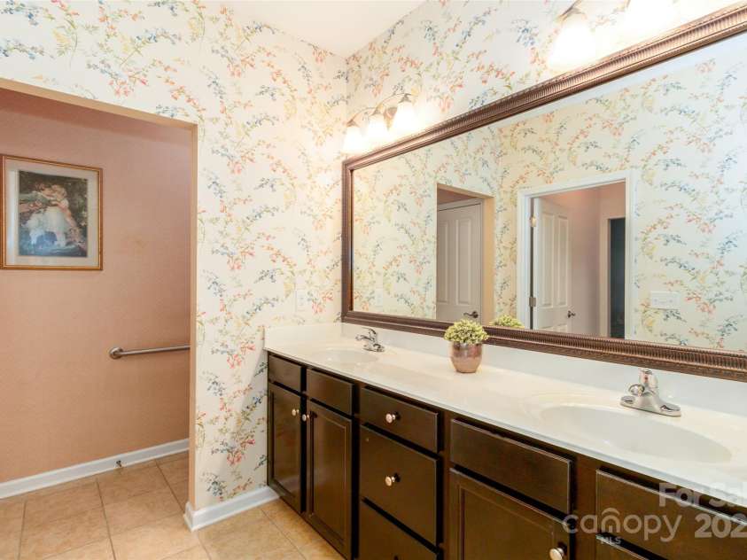 4423 Parkgate Drive, Matthews, NC 28105.  MLS# CAR4286068, YatesRealty ID 30702. Primary Bath-wallpaper being removed this week