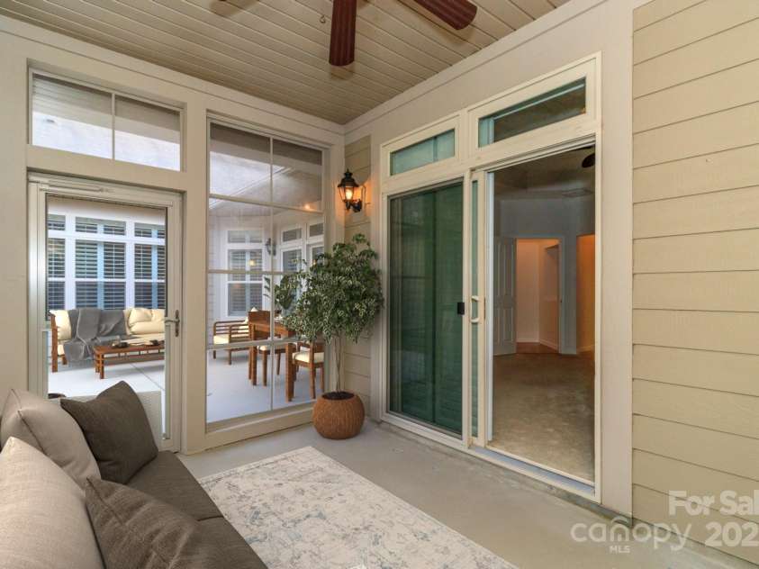 4423 Parkgate Drive, Matthews, NC 28105.  MLS# CAR4286068, YatesRealty ID 30702. Screen porch with 2 way access