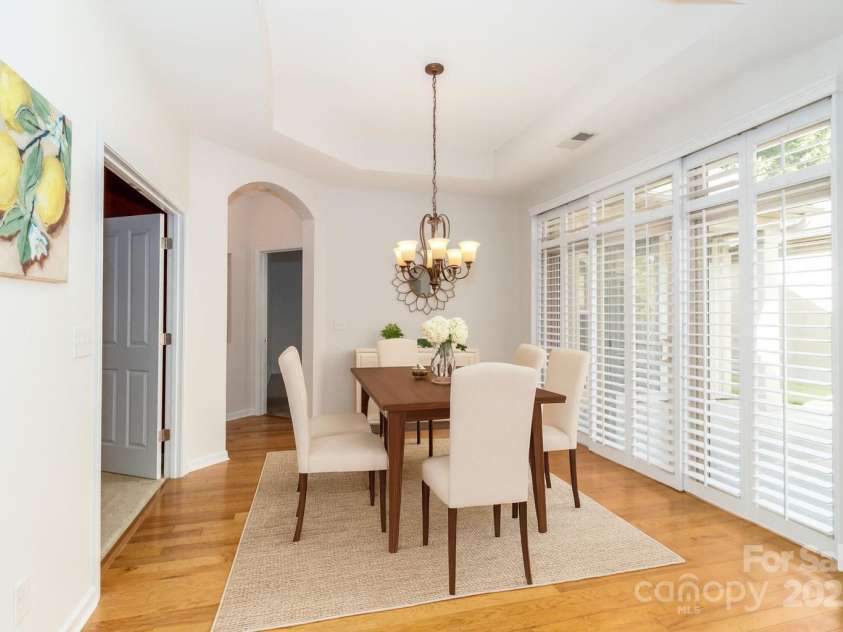 4423 Parkgate Drive, Matthews, NC 28105.  MLS# CAR4286068, YatesRealty ID 30702. Virtually Staged Dinning Room