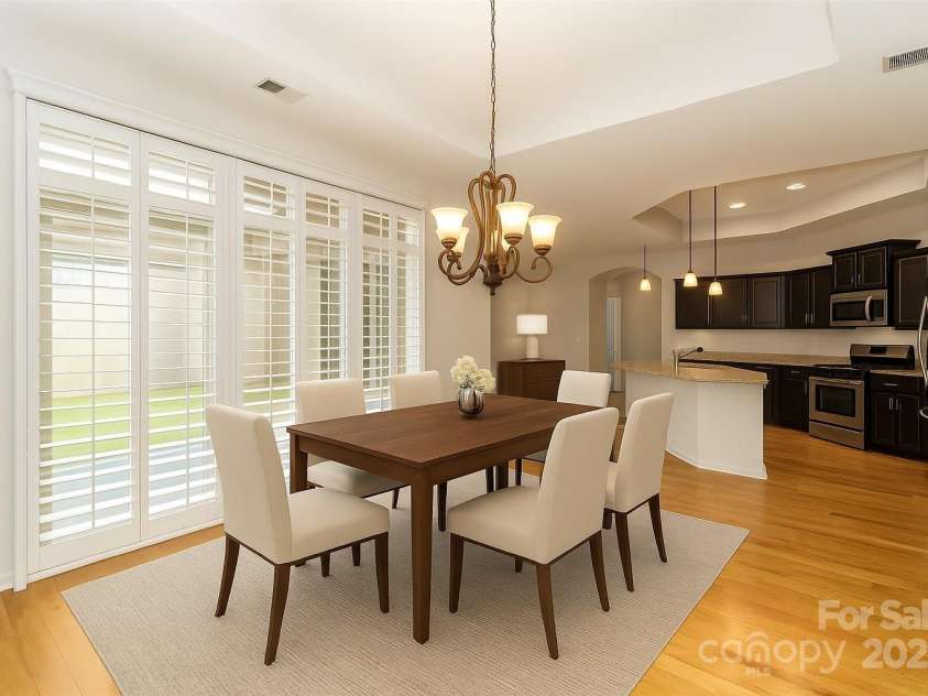 4423 Parkgate Drive, Matthews, NC 28105.  MLS# CAR4286068, YatesRealty ID 30702. Virtually Staged Dinning Room