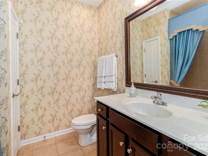 4423 Parkgate Drive, Matthews, NC 28105.  MLS# CAR4286068, YatesRealty ID 30702. Wallpaper being removed this week
