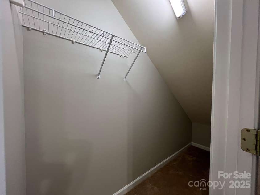155 Limerick Road, Mooresville, NC 28115.  MLS# CAR4284761, YatesRealty ID 30708. Also near the kitchen, you will find this storage closet that is tucked under the stairs.