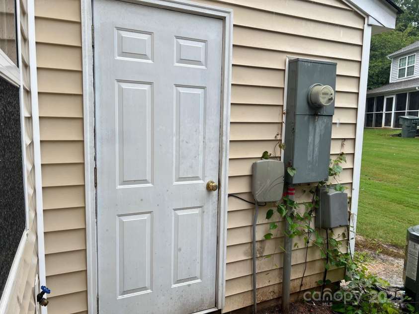 155 Limerick Road, Mooresville, NC 28115.  MLS# CAR4284761, YatesRealty ID 30708. Outside, there is a storage closet off the patio.