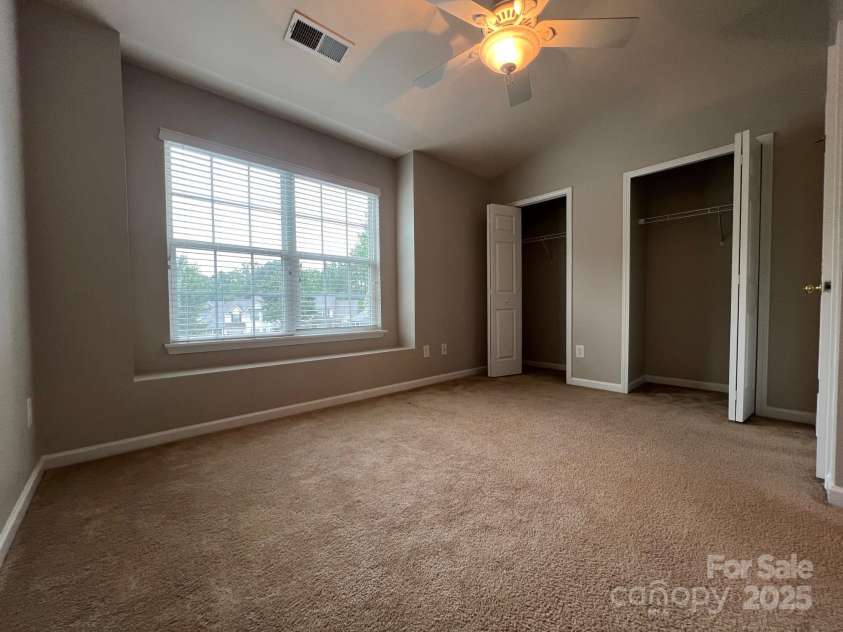 155 Limerick Road, Mooresville, NC 28115.  MLS# CAR4284761, YatesRealty ID 30708. Upstairs on the front of the home is found this bedroom suite.