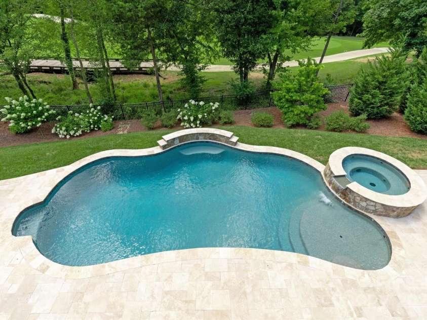 1100 Seminole Drive, Indian Land, SC 29707.  MLS# CAR4285132, YatesRealty ID 30711. Anthony Sylvan heated pool with spa built in 2019. Travertine pavers