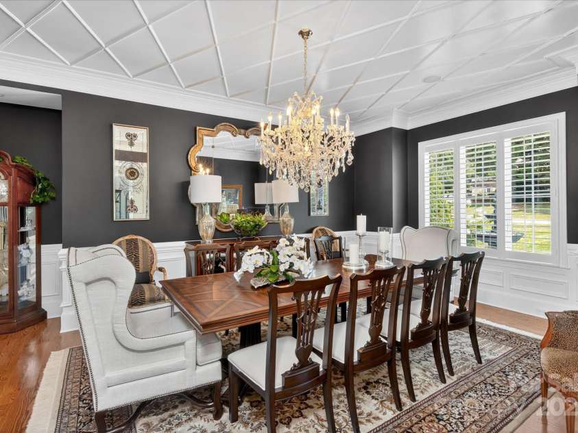 1100 Seminole Drive, Indian Land, SC 29707.  MLS# CAR4285132, YatesRealty ID 30711. Gracious dining room with accent ceiling and crystal chandelier